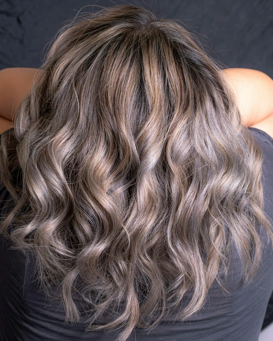Soft silver-brown waves with blended highlights